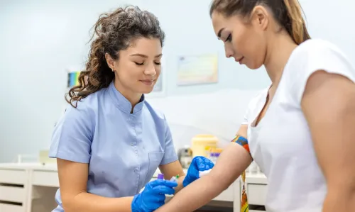Medical laboratory testing equipment and samples, representing comprehensive fertility and pregnancy lab work